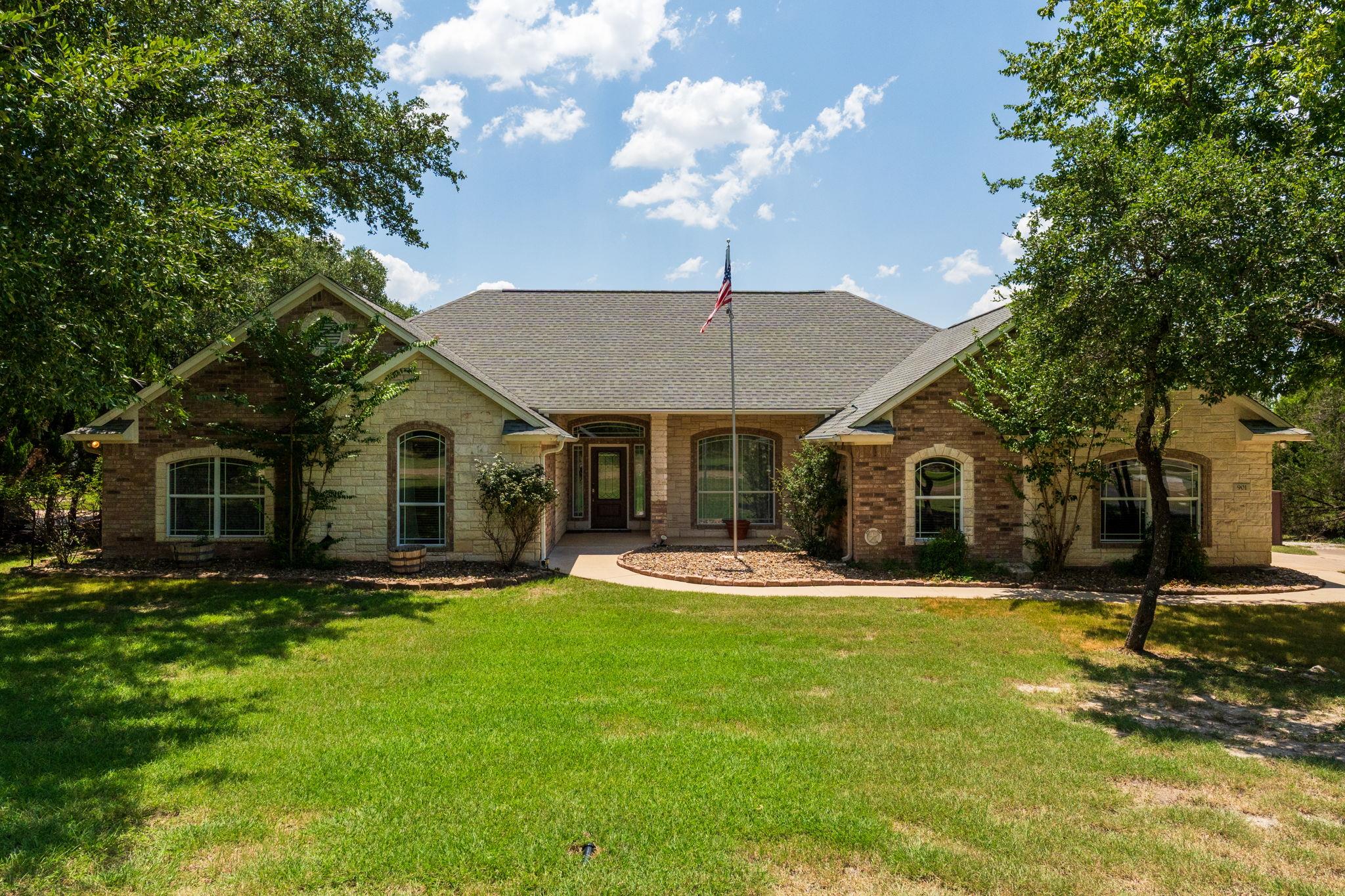 An inviting stone and brick exterior welcomes you