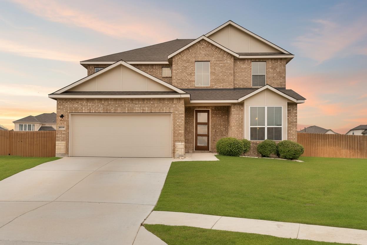 Multi-textured brick masonry highlights the facad