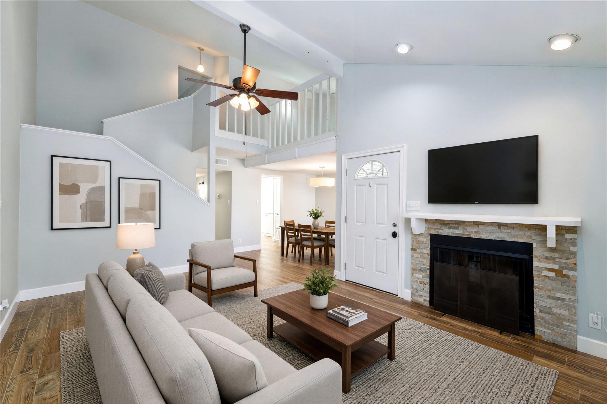 Soaring vaulted ceilings and a classic stone fire