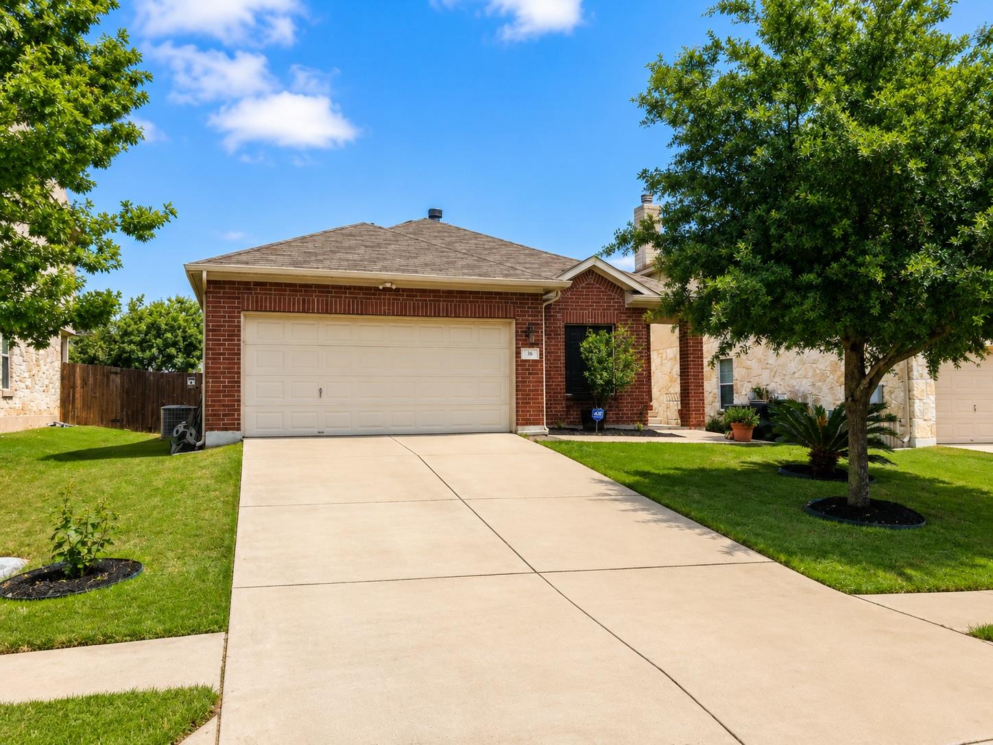 Classic brick exterior framing an attached garage