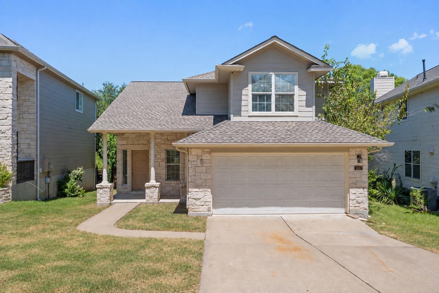 Natural stone accents and classic siding details 