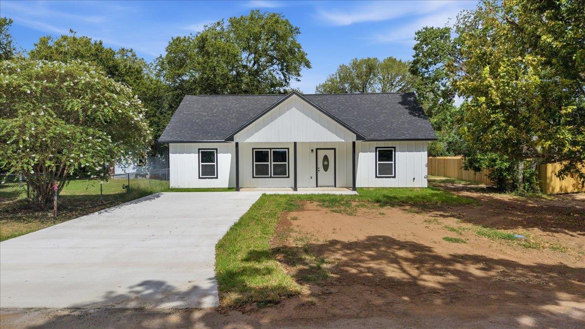 Crisp board and batten siding pairs with a clean 