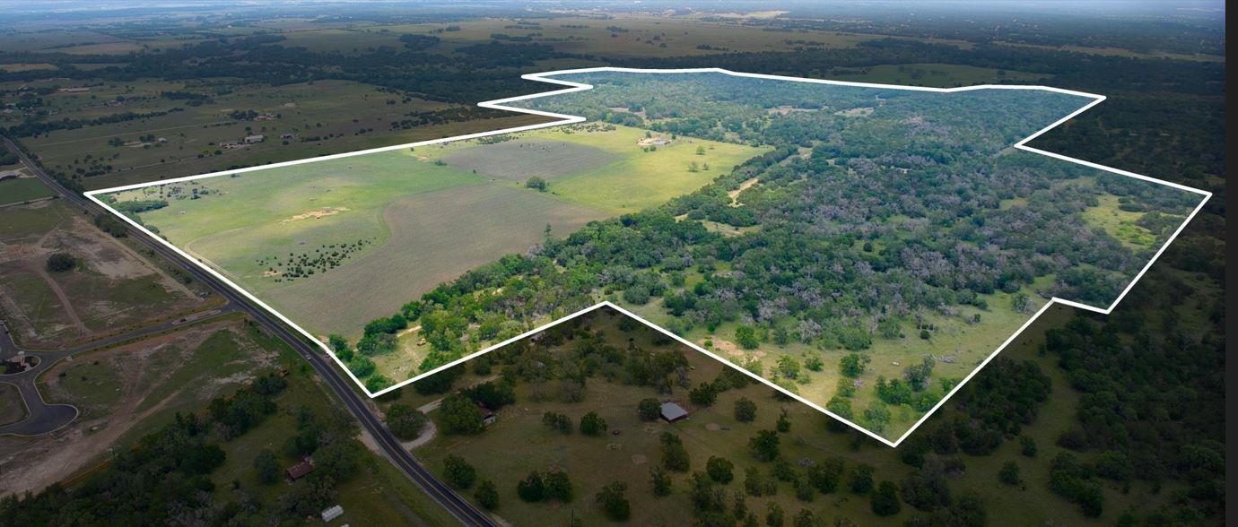 Vast acreage outlines a mixture of cleared pastur