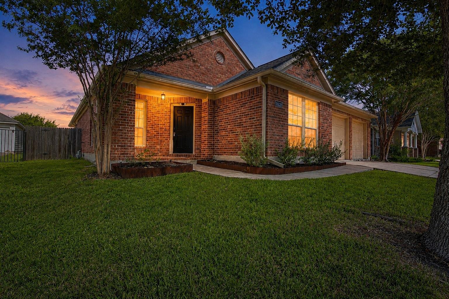 Warm light glows from the windows of this classic
