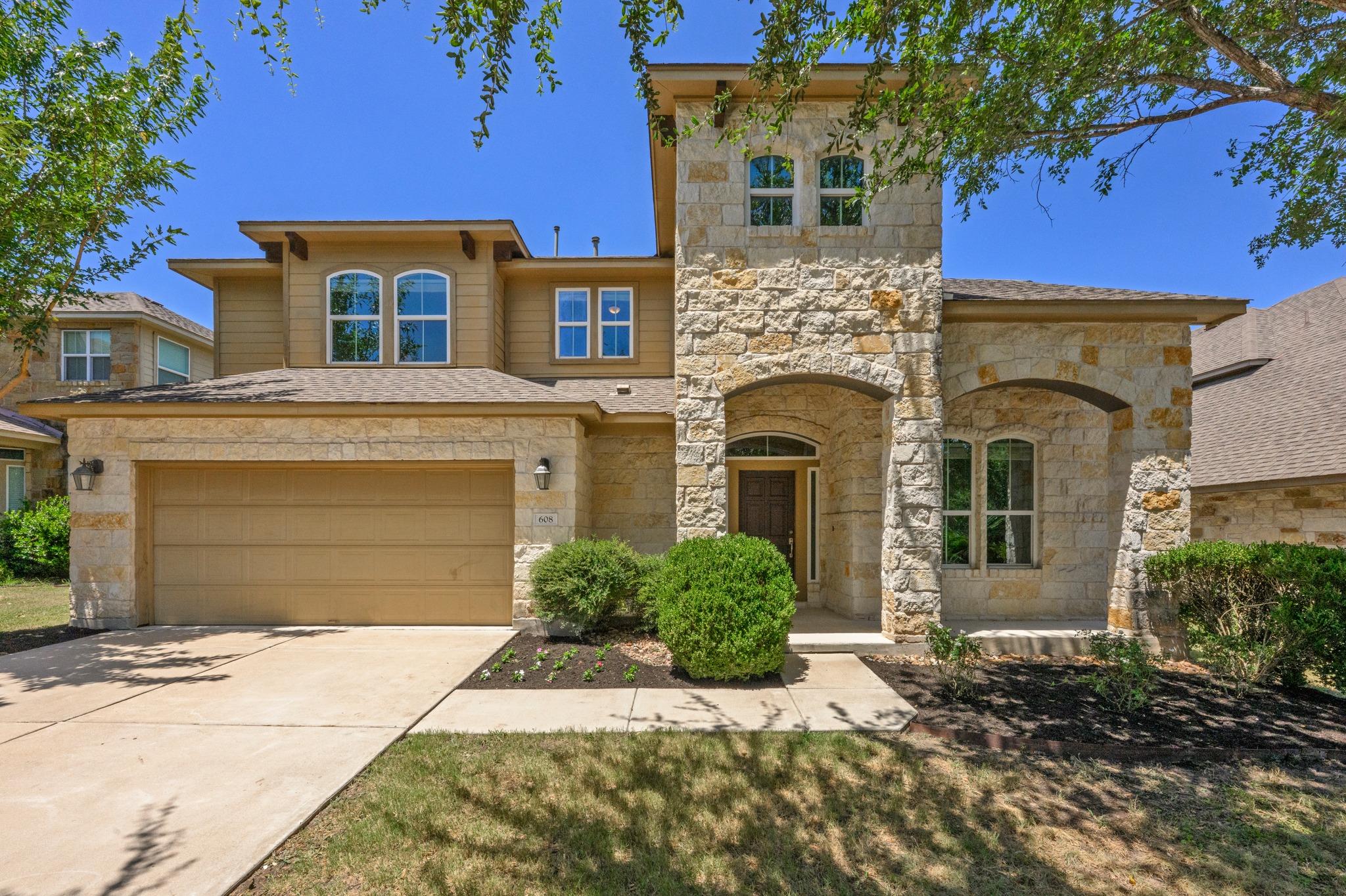 Natural stone masonry and siding create a strikin
