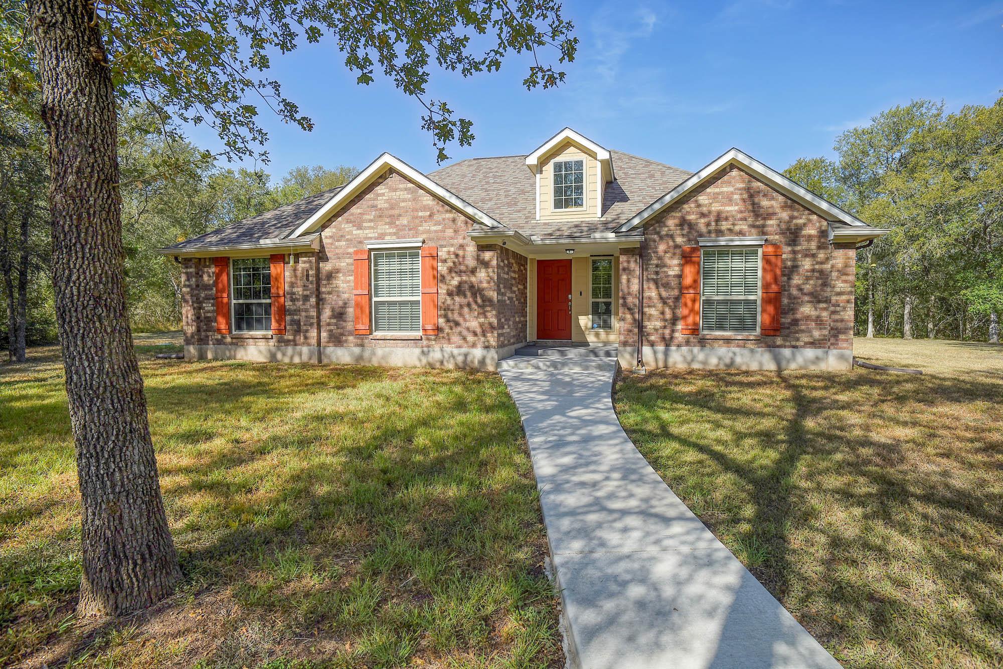 Classic brick exterior highlights this single-sto