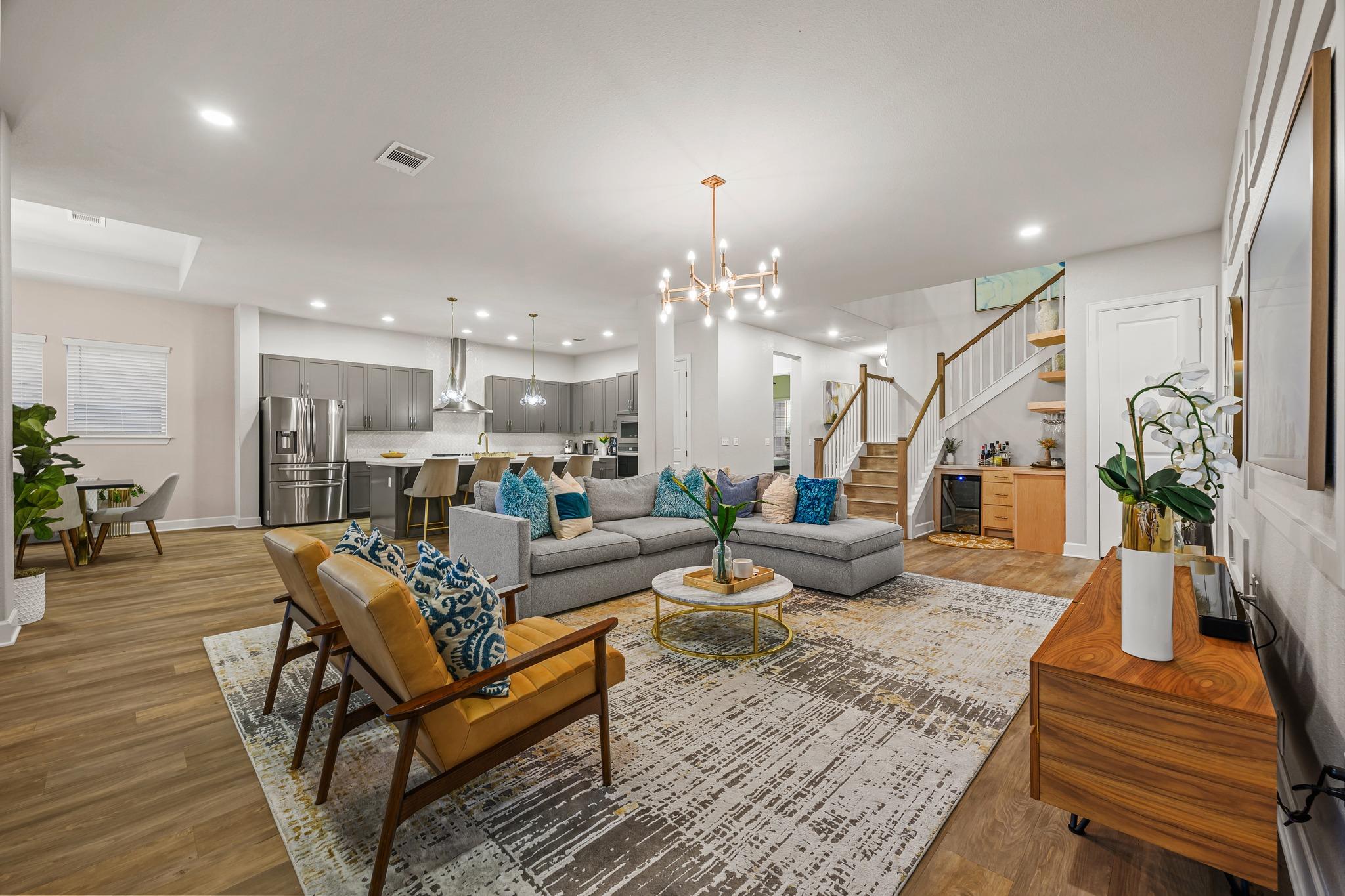 Gleaming wood floors anchor a seamless transition