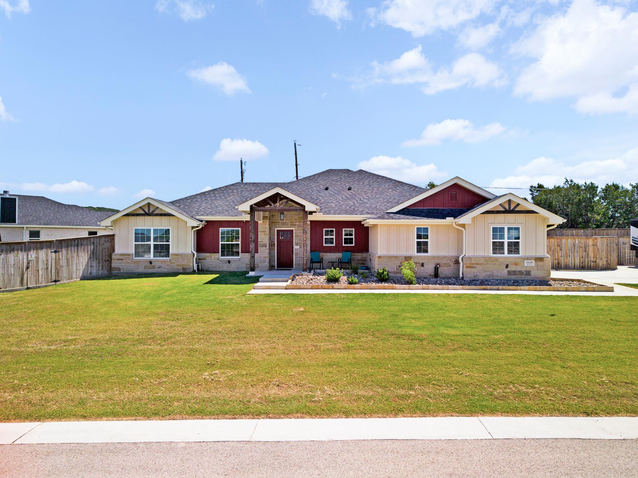 Board and batten siding pairs with stone accents 