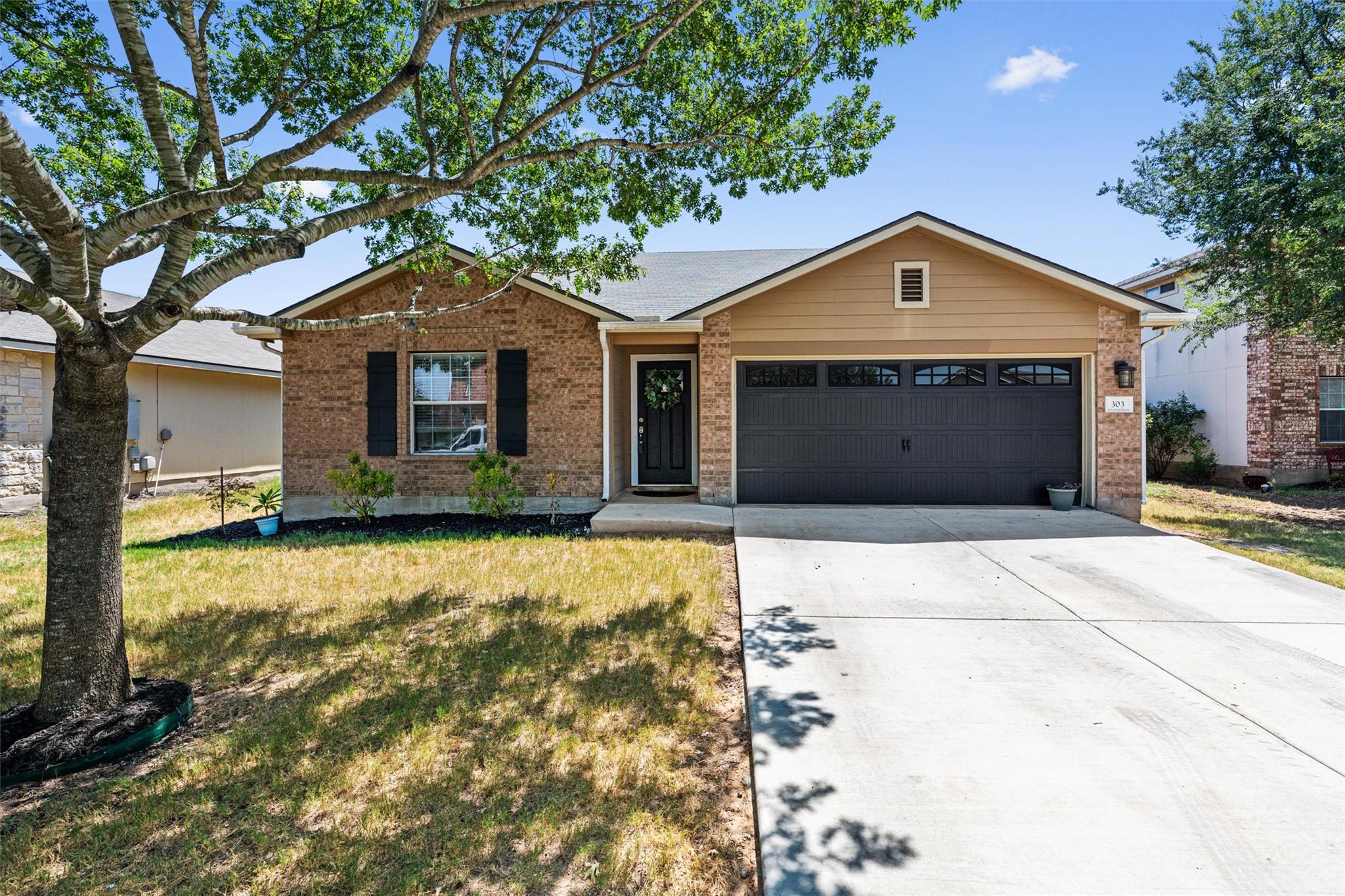 Classic brick exterior accents frame a clean conc