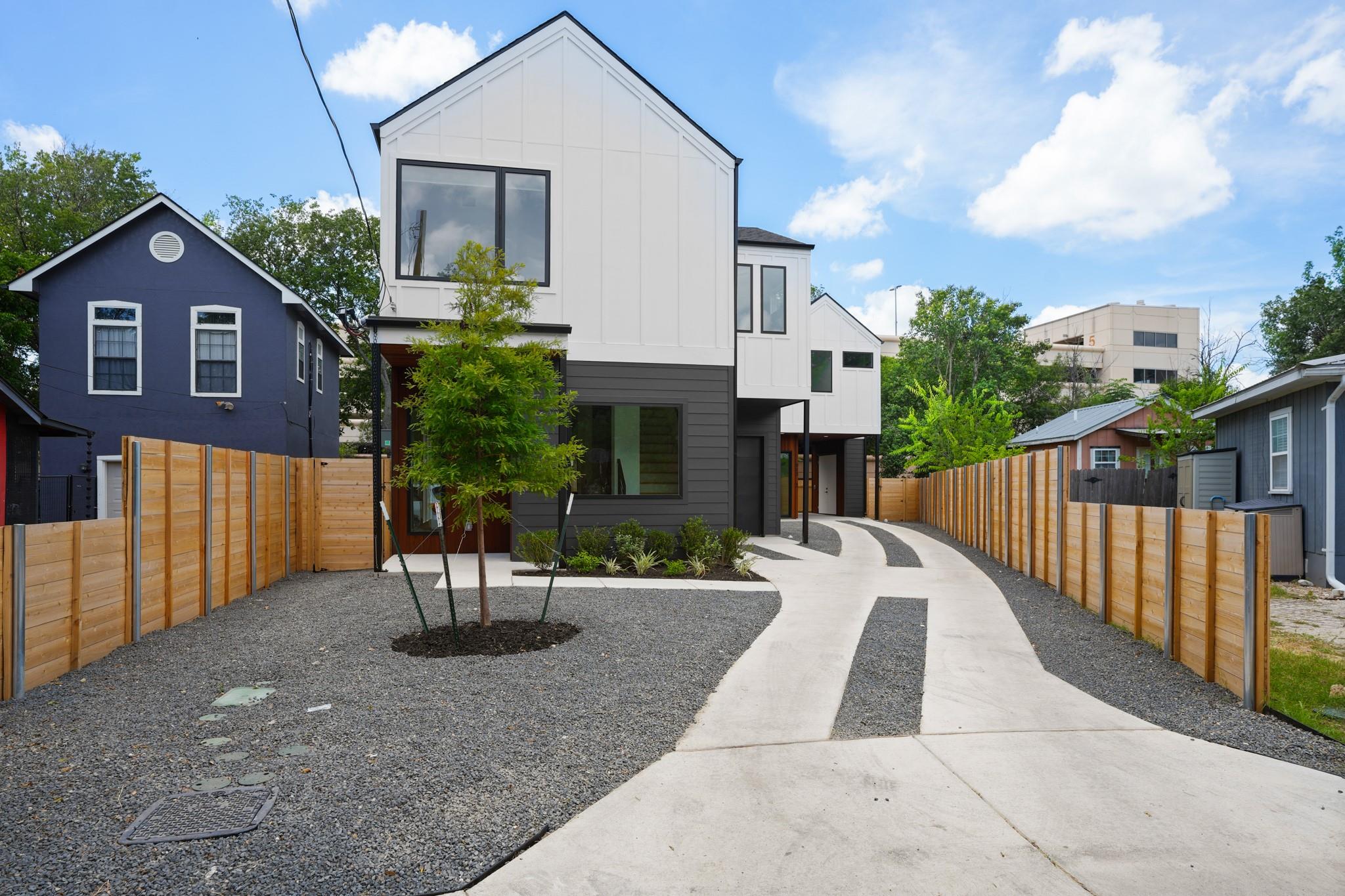 Sleek lines and modern vertical siding define thi