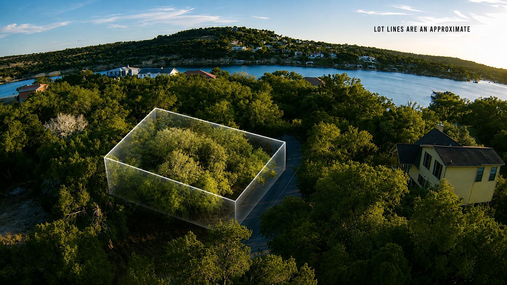 Wooded homesite overlooks the water surrounded by