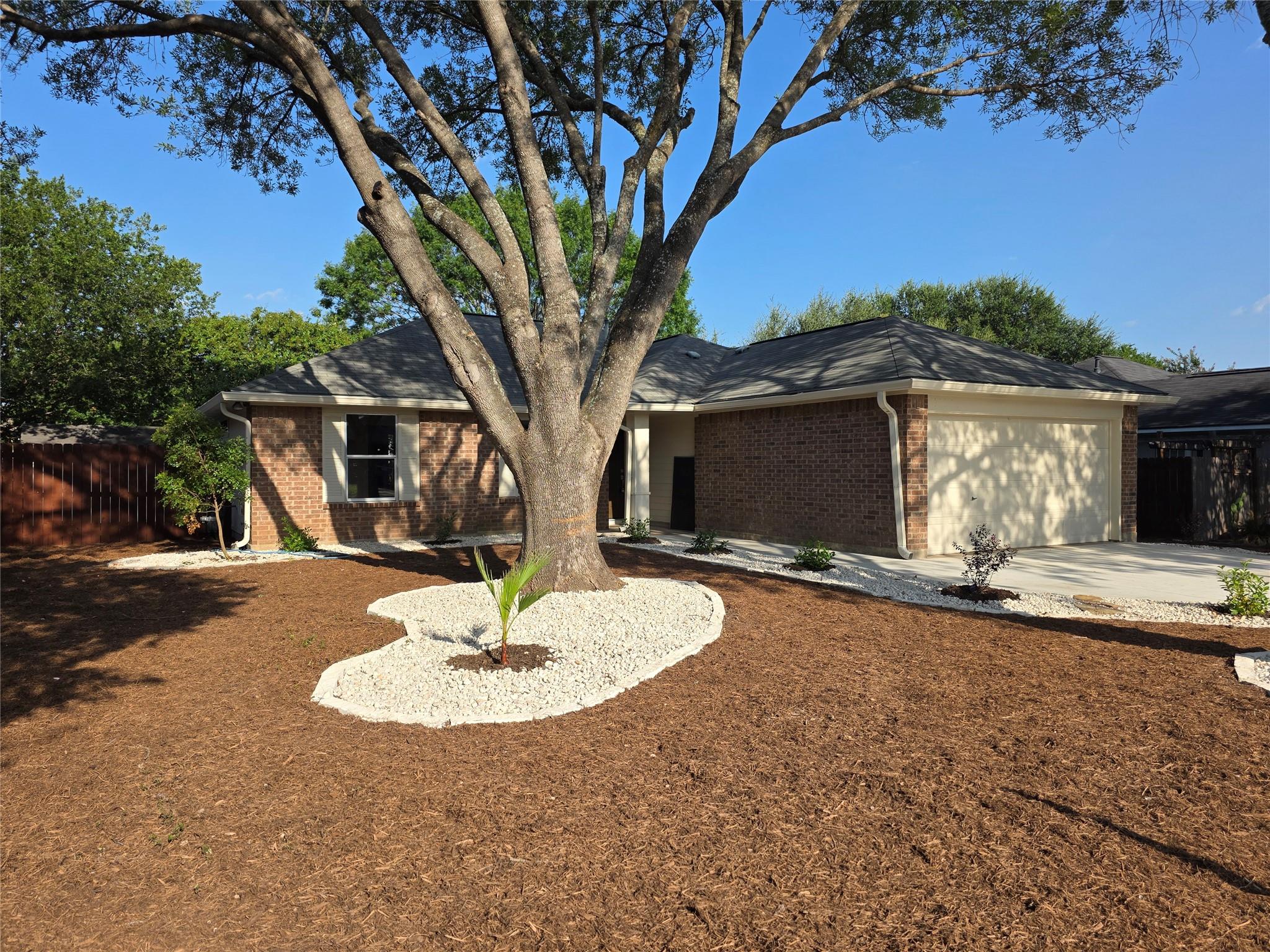 Mature shade trees and professional landscaping f