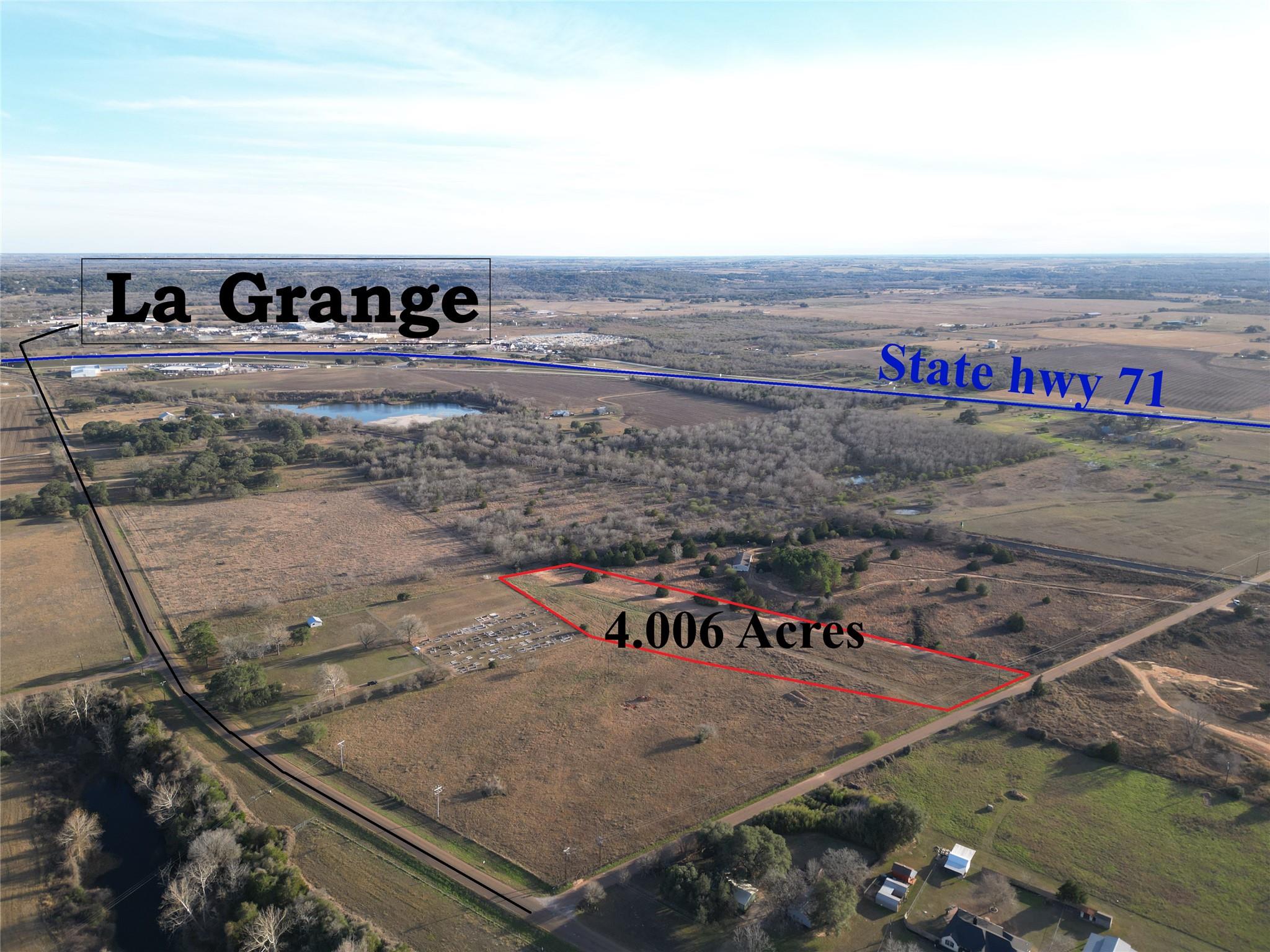 Expansive rural acreage offers open fields and co