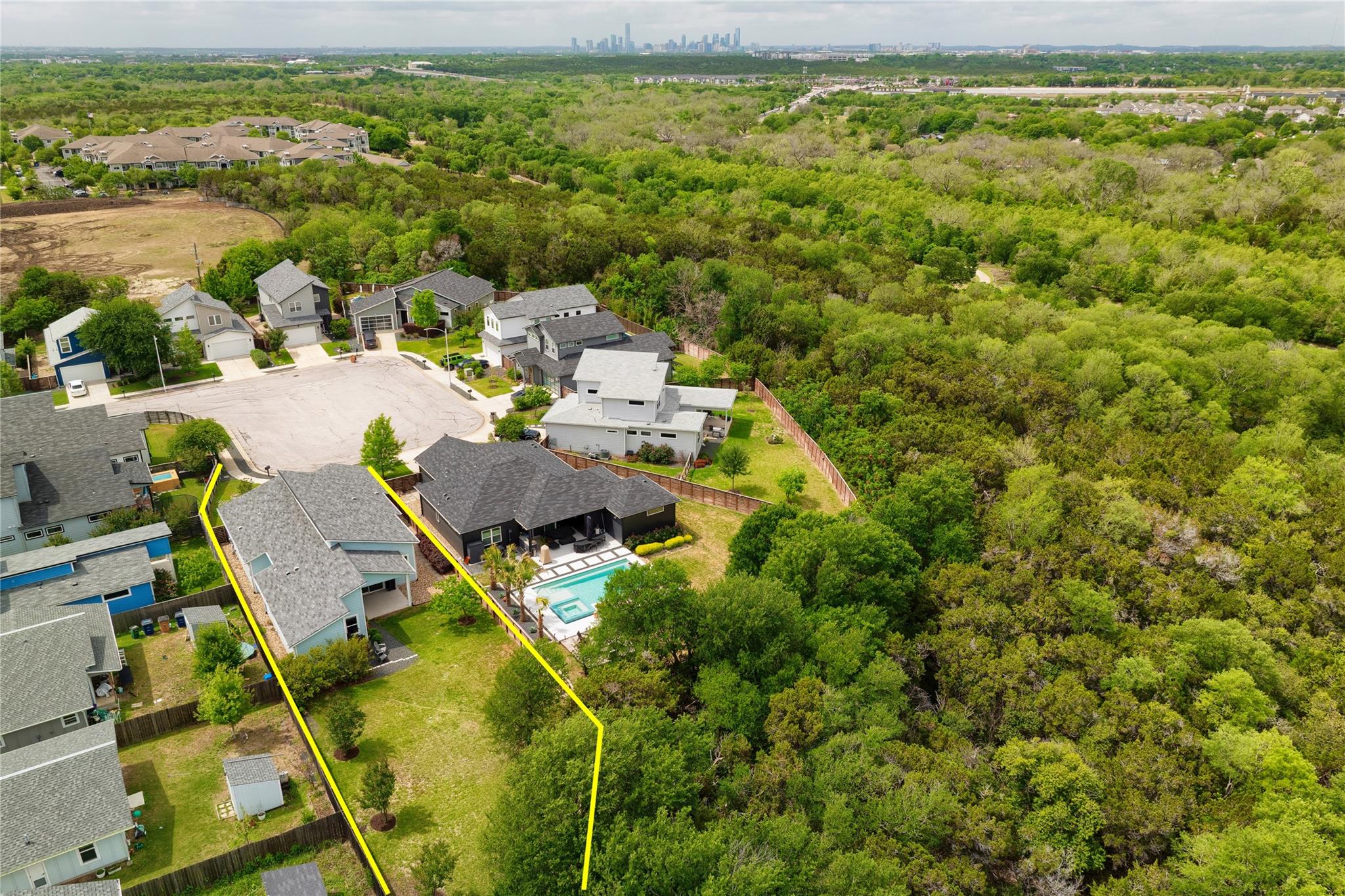 Aerial perspective reveals a suburban property bo