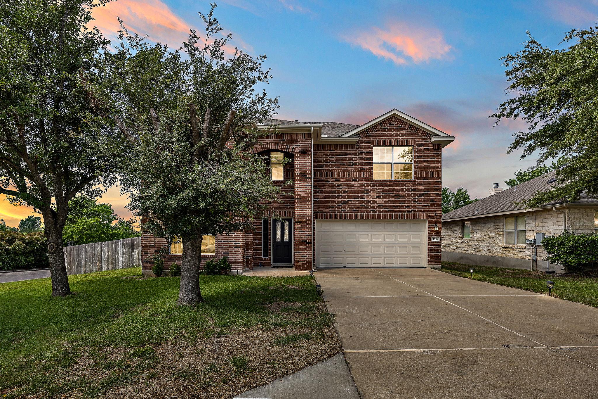 Stately brick construction defines this two-story