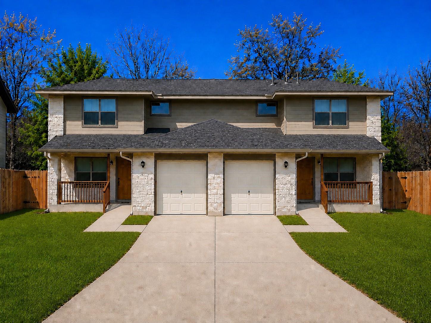 Symmetrical design highlights this two-story ston