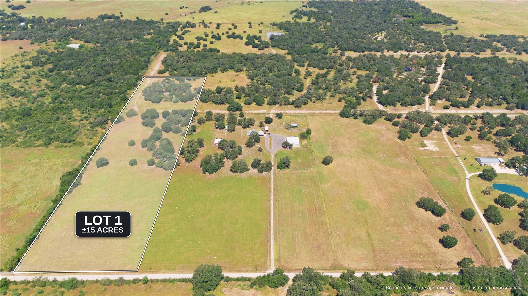 Acres of open pasture and mature trees frame this