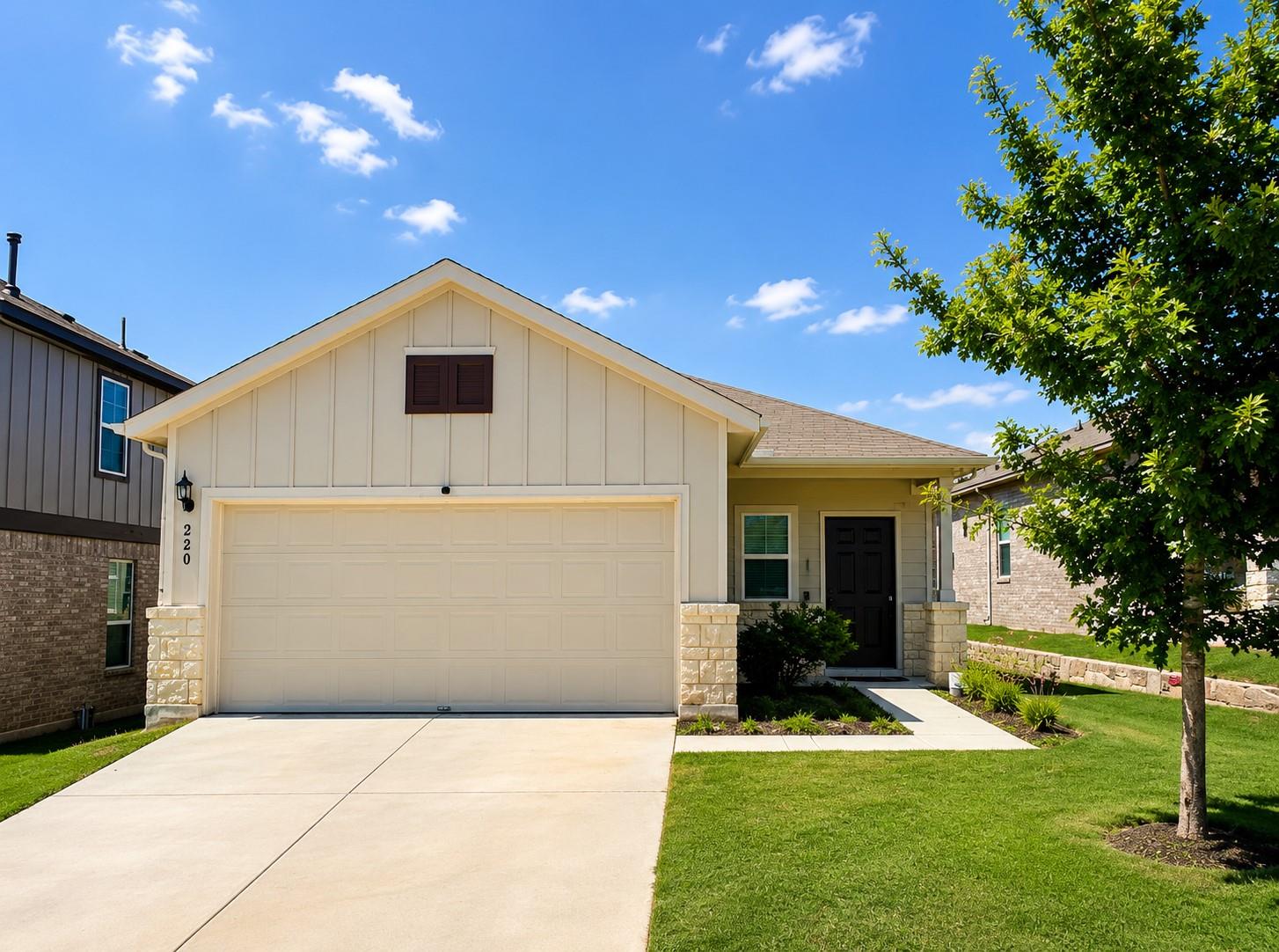An inviting front elevation pairs neat vertical s