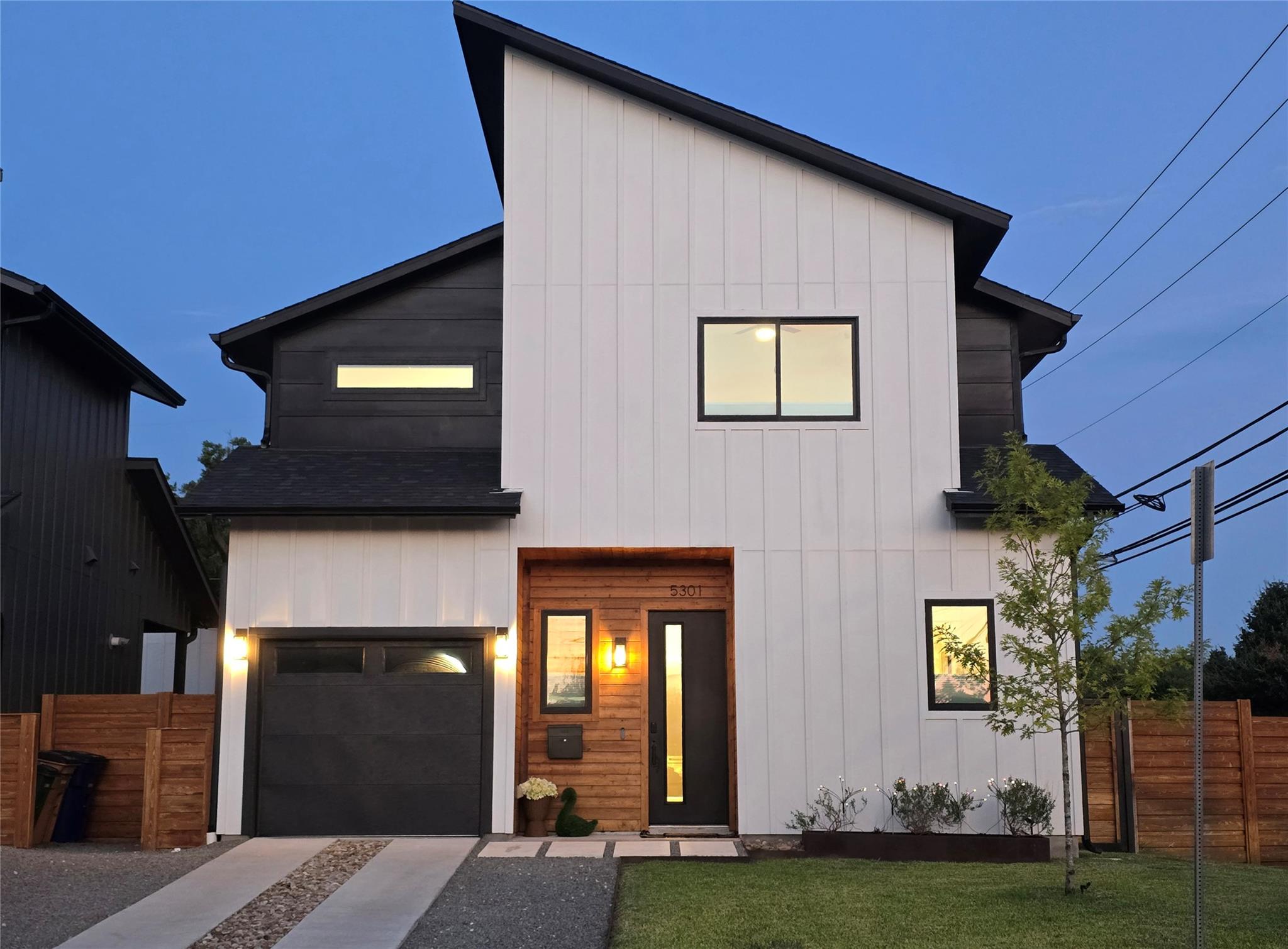 Bold geometric lines and warm wood accents define