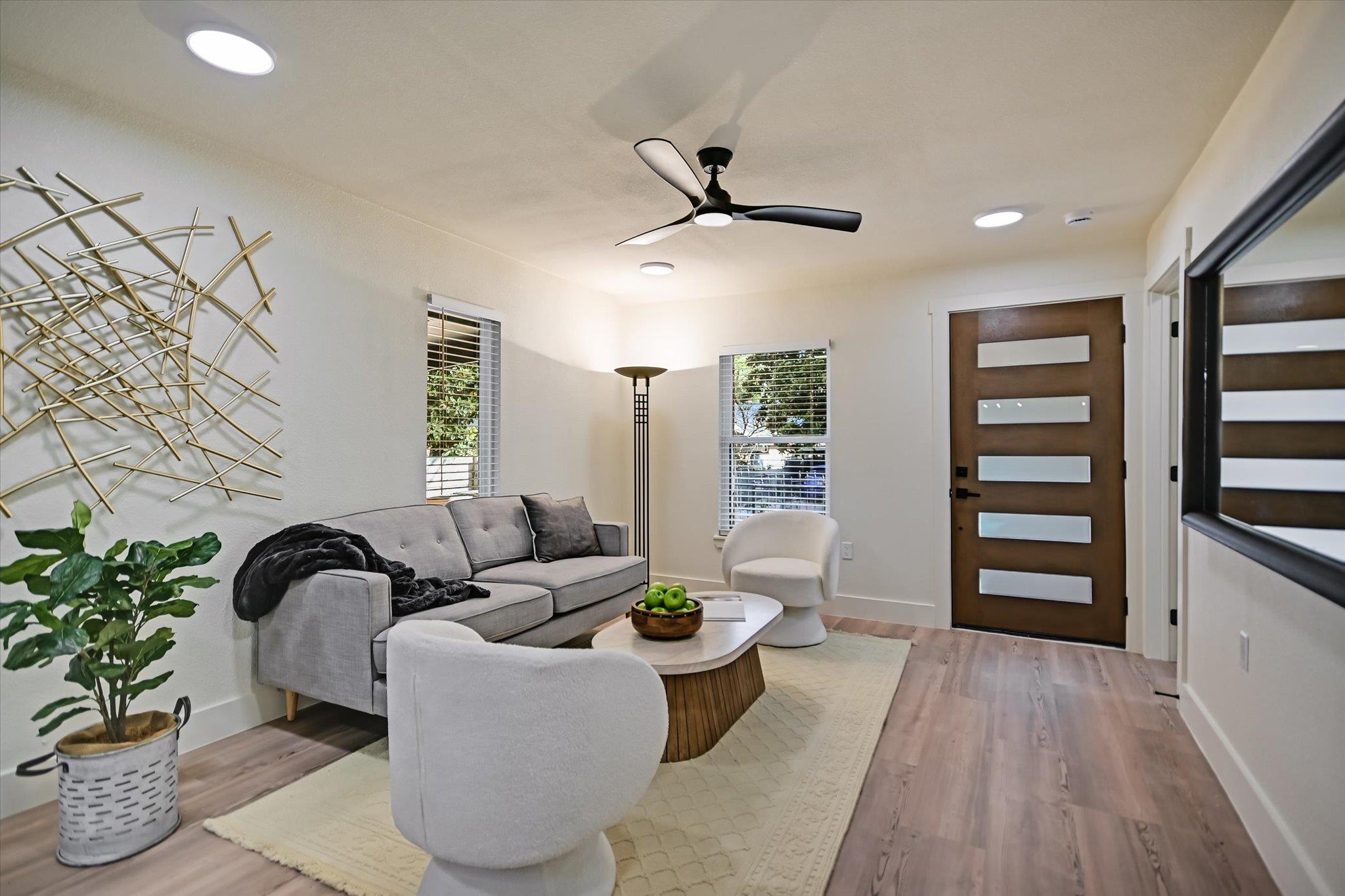 Smooth wood-look flooring and integrated ceiling 