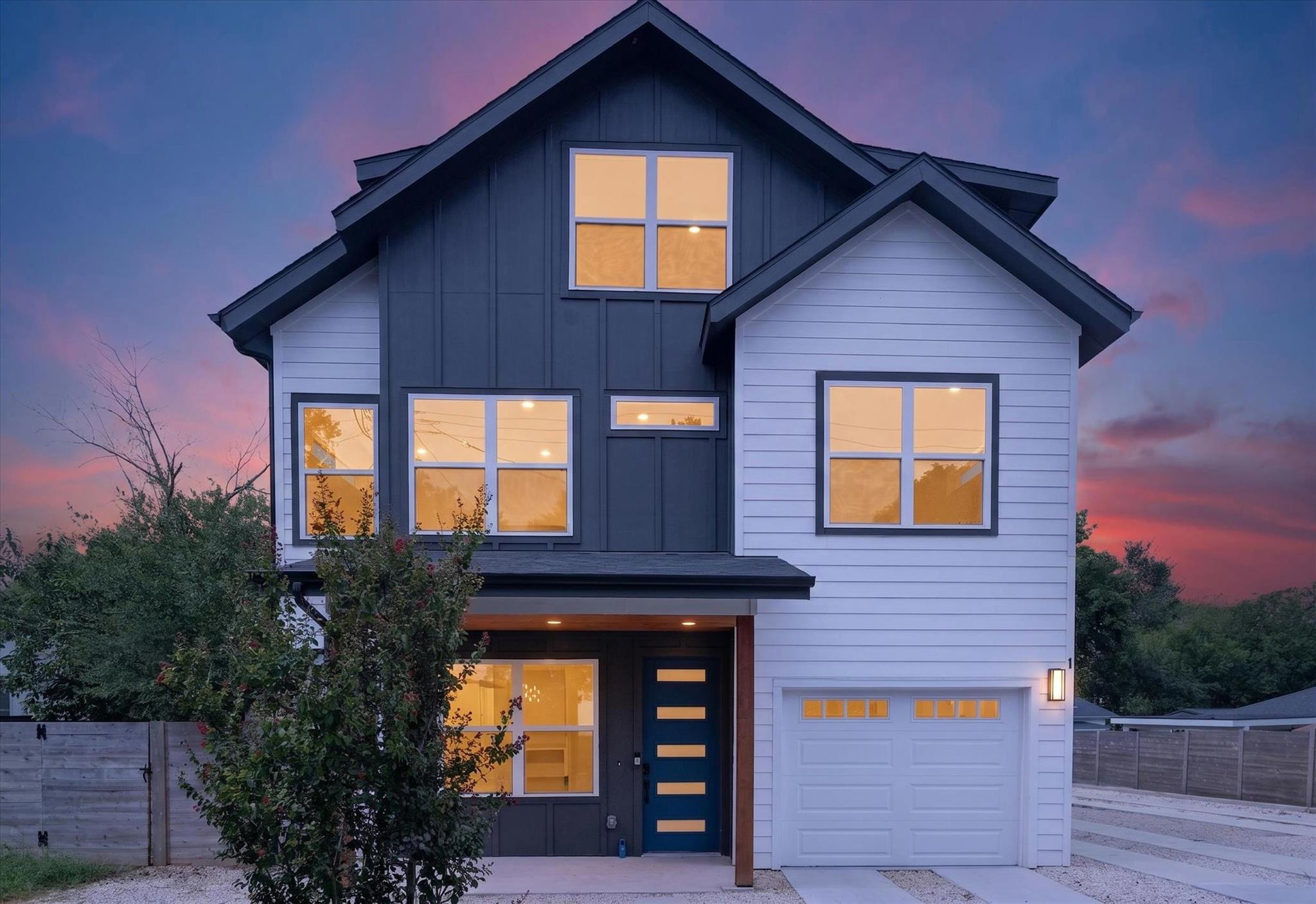 Bold contrast siding and clean lines define this 