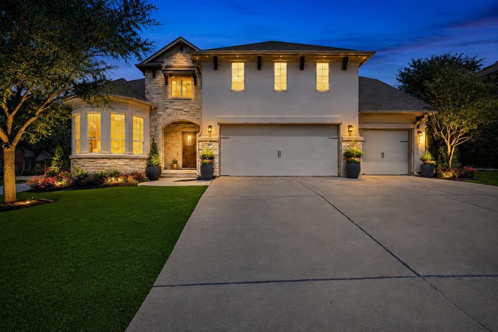 Stone and stucco accents define this contemporary