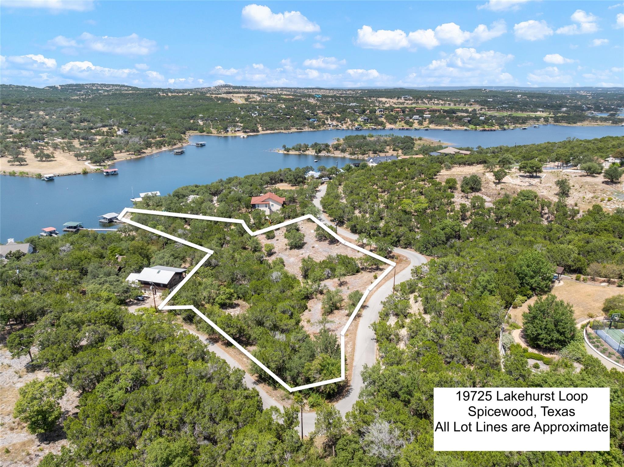 Wooded acreage near the water offers potential fo