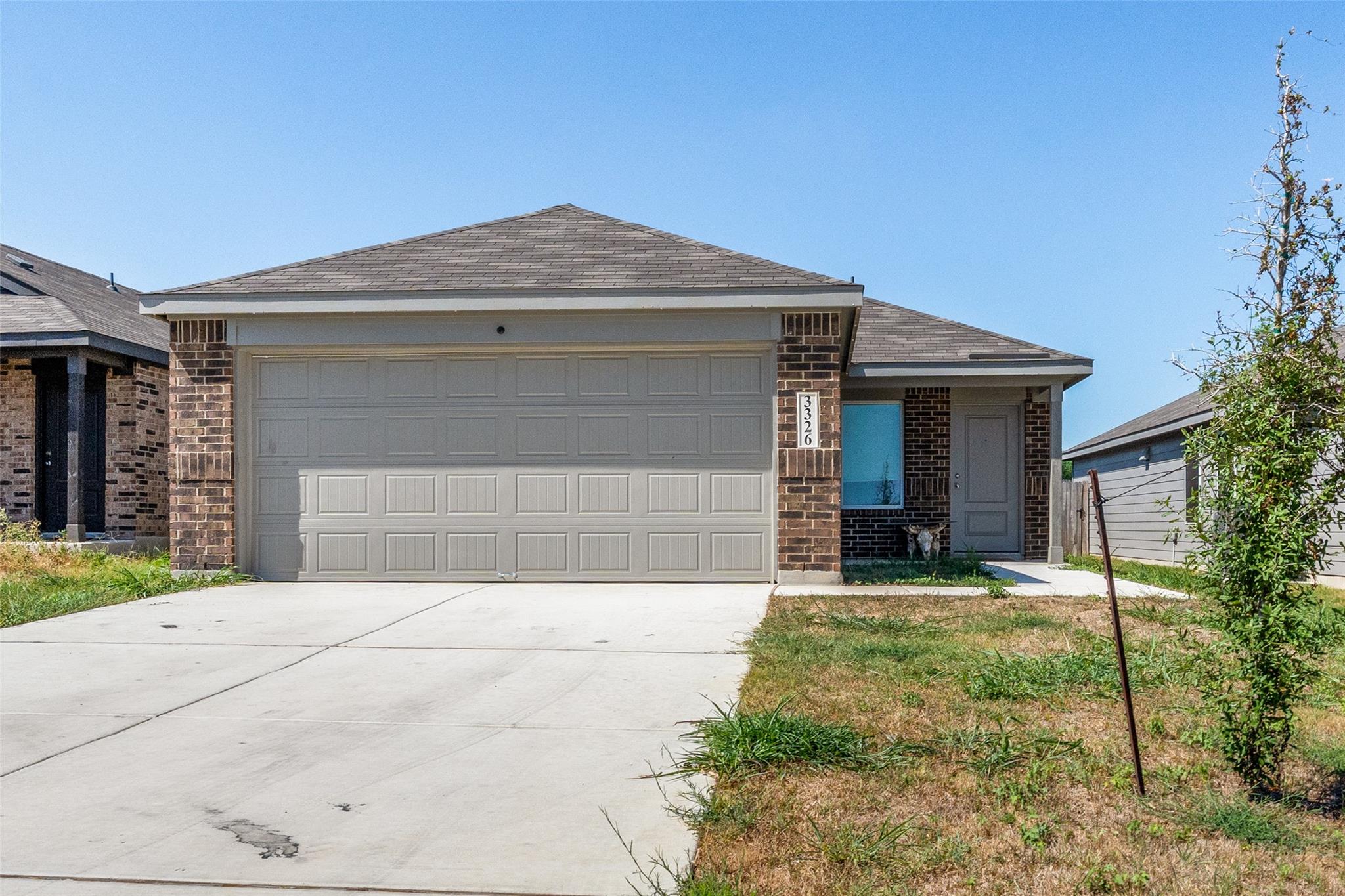 Classic brick exterior highlights this single-sto