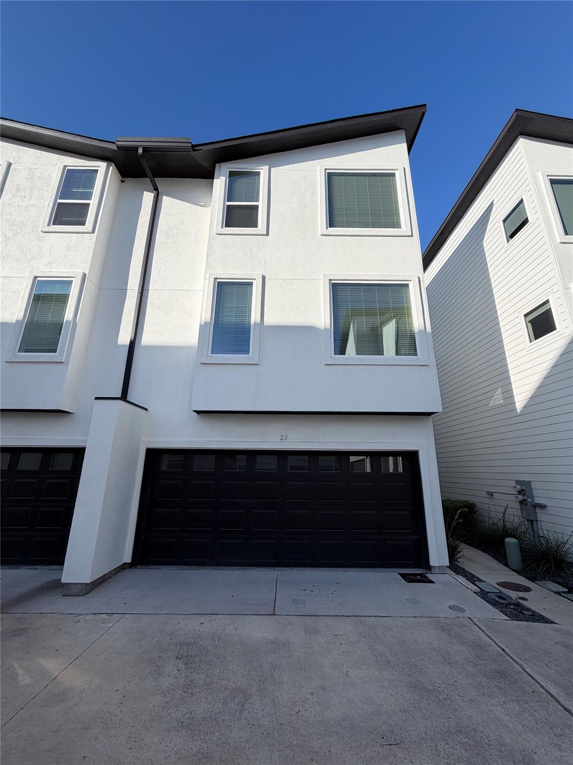 Clean modern architectural lines define this mult