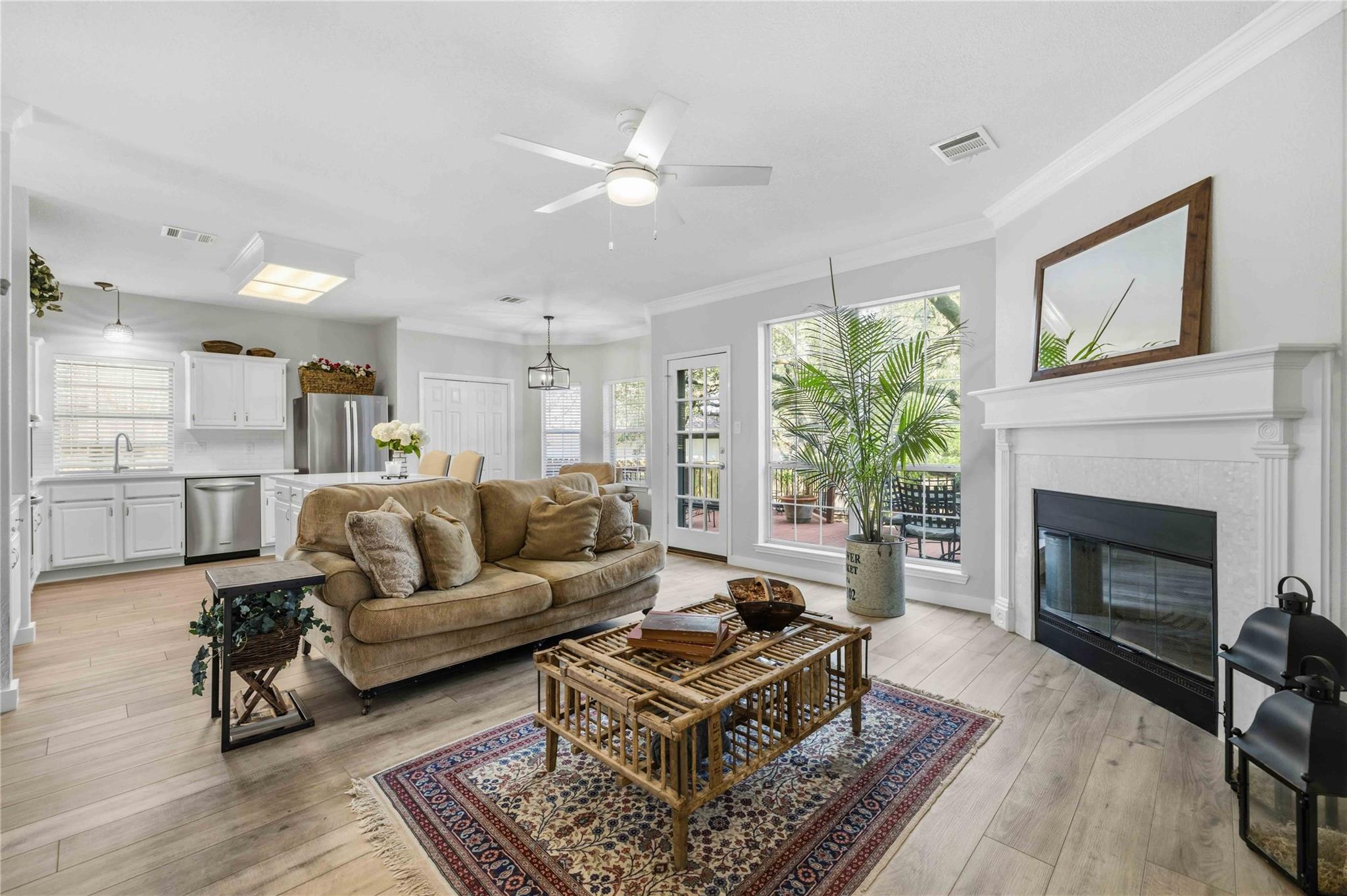 An open living space links the fireplace area to 