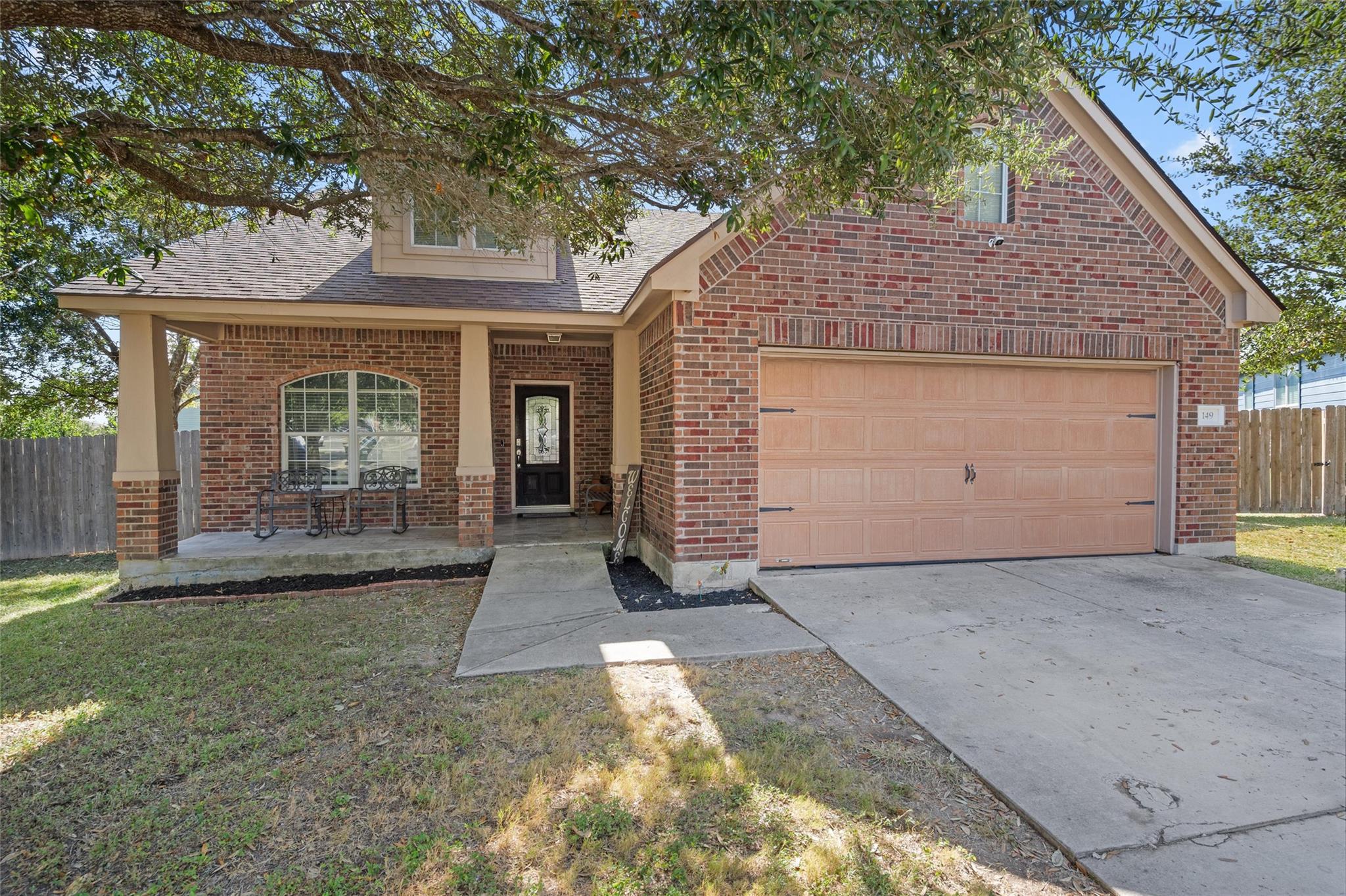Classic brick exterior and inviting front porch c