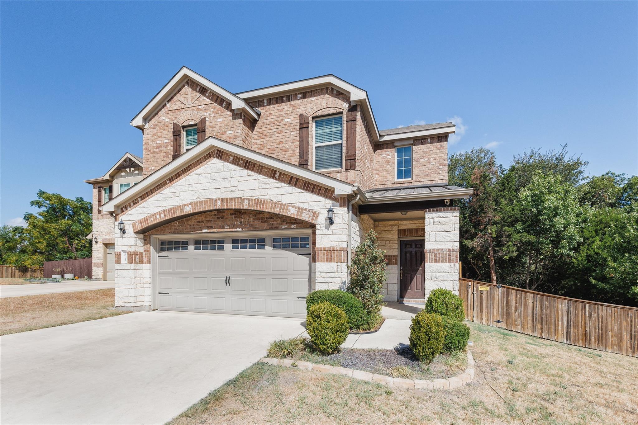 A classic brick and stone facade combines with a 