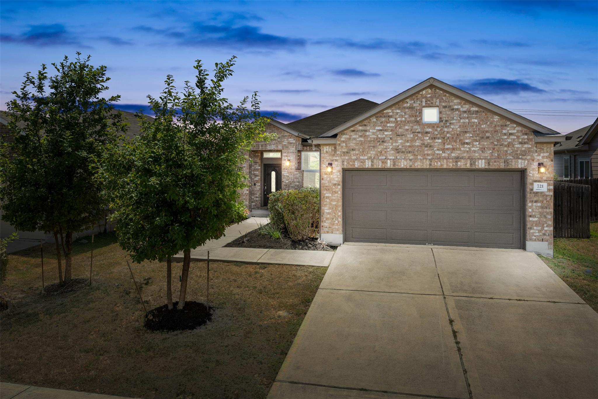 Classic brick exterior accents this single-story 