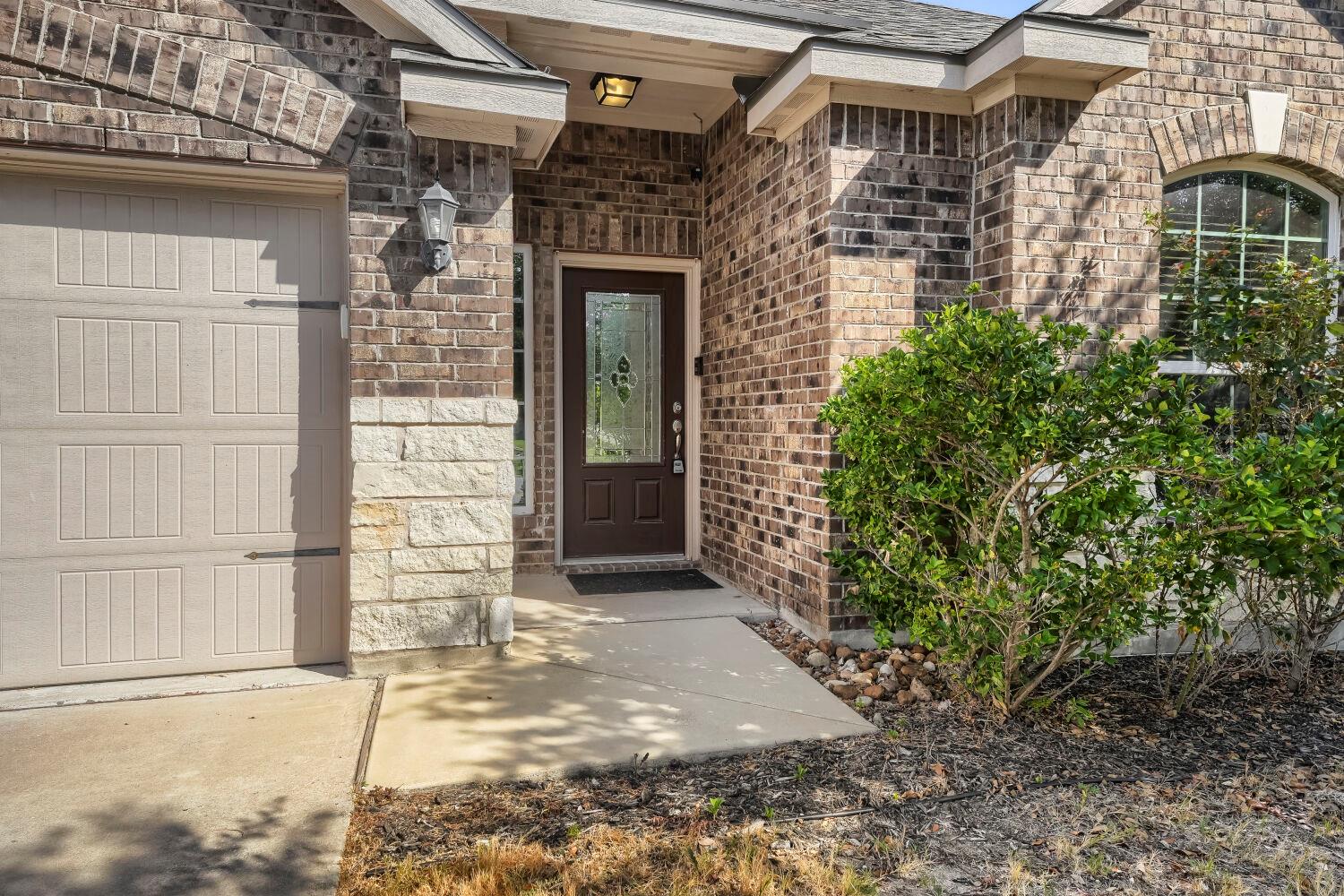 A classic brick exterior surrounds a welcoming fr