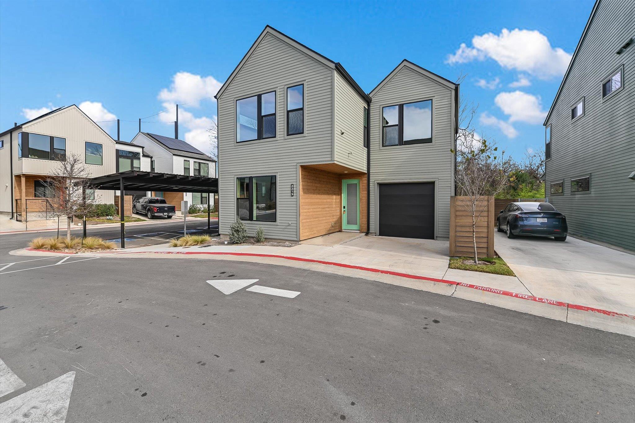 Sharp lines and modern warm wood accents define t