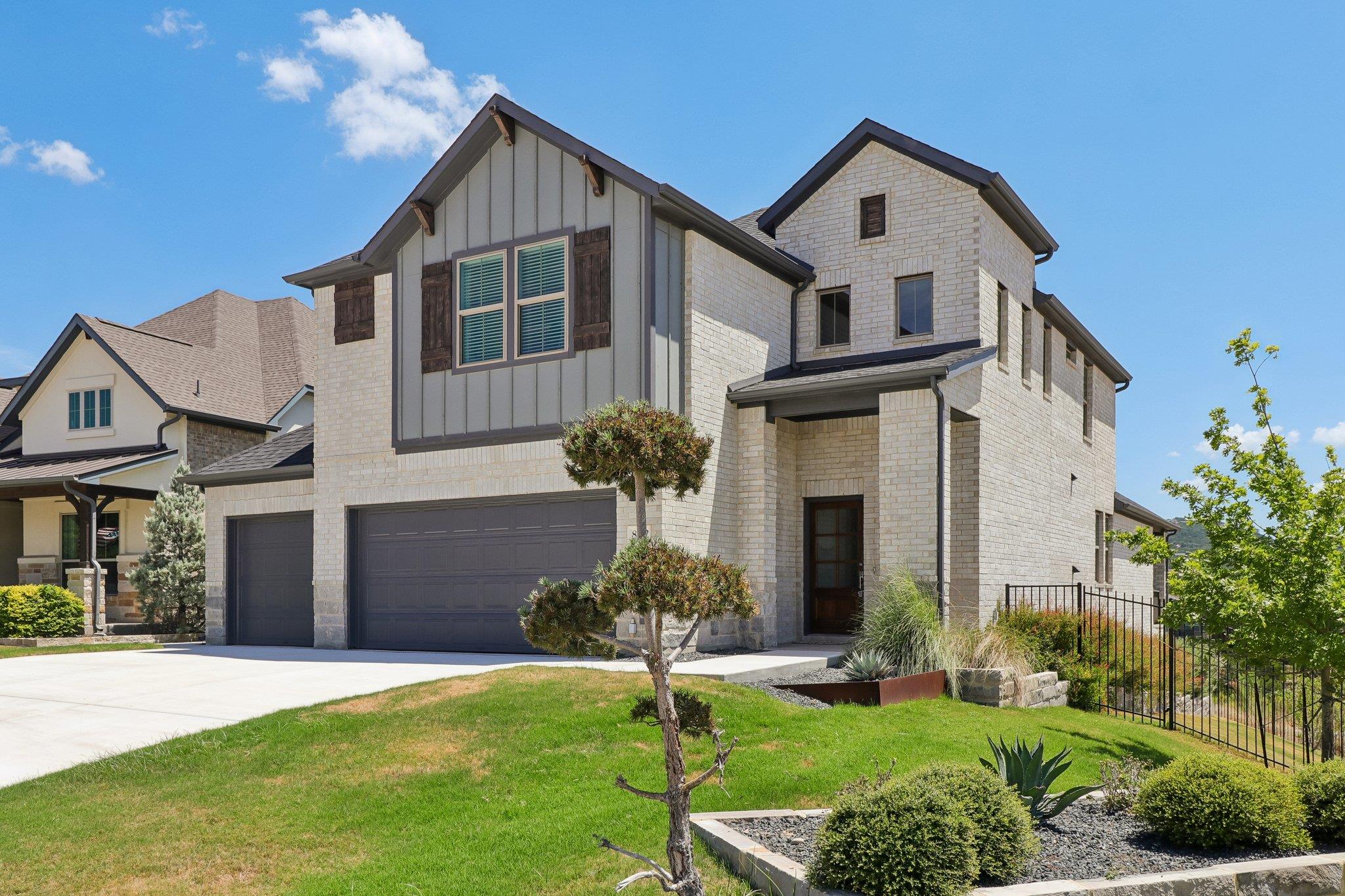 Limestone masonry and vertical board and batten s