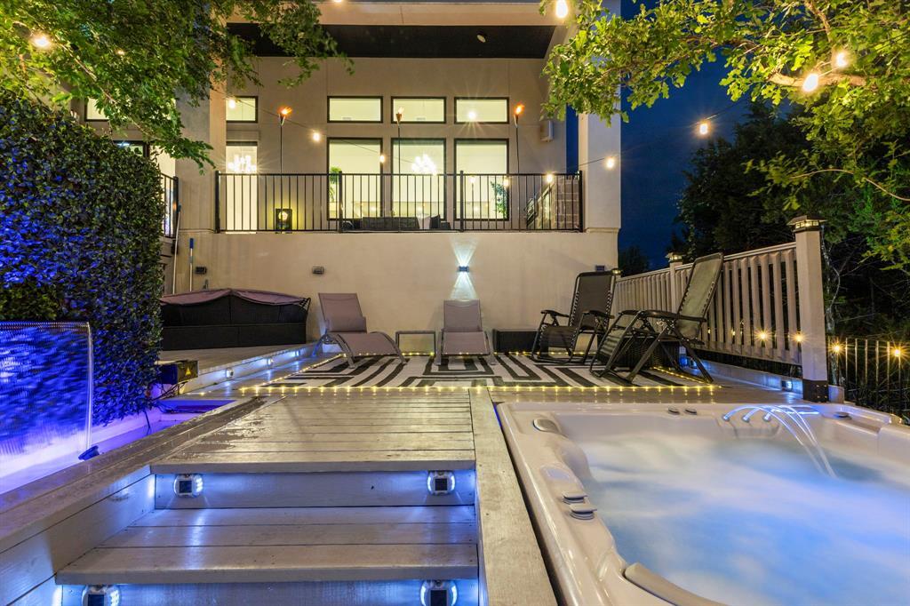 Multi-level wooden decking integrates a built-in 
