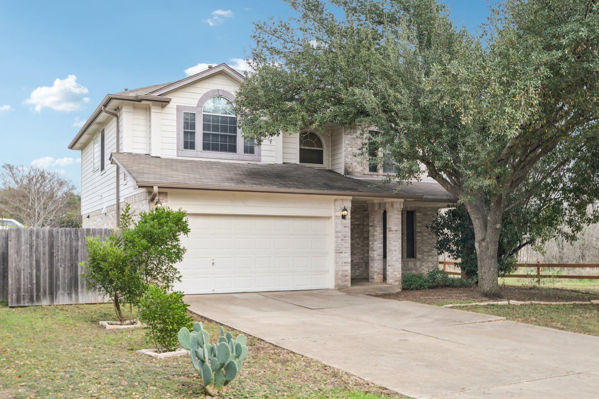 Traditional-style house with an attached garage, 