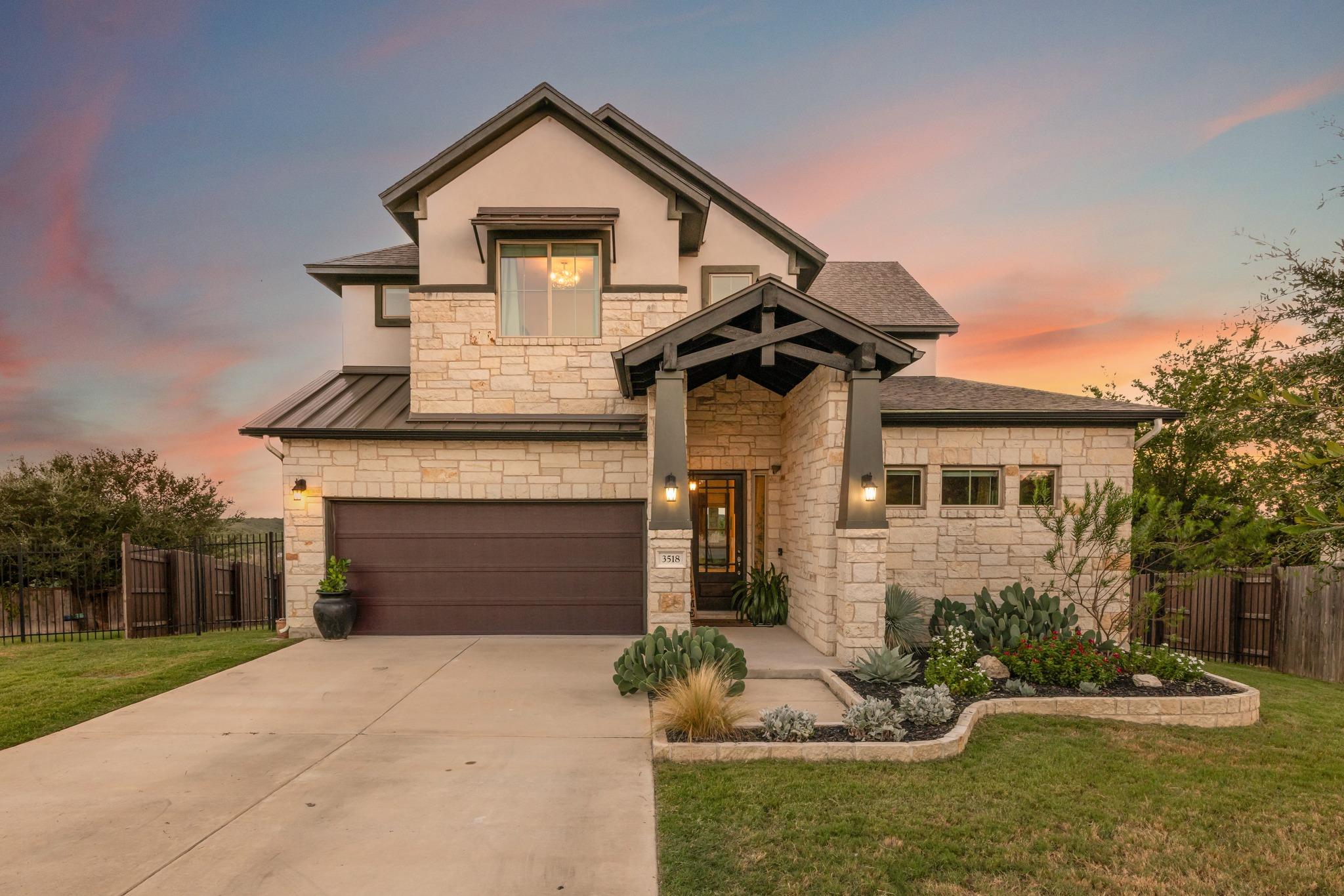 Natural stone and stucco detailing define this co