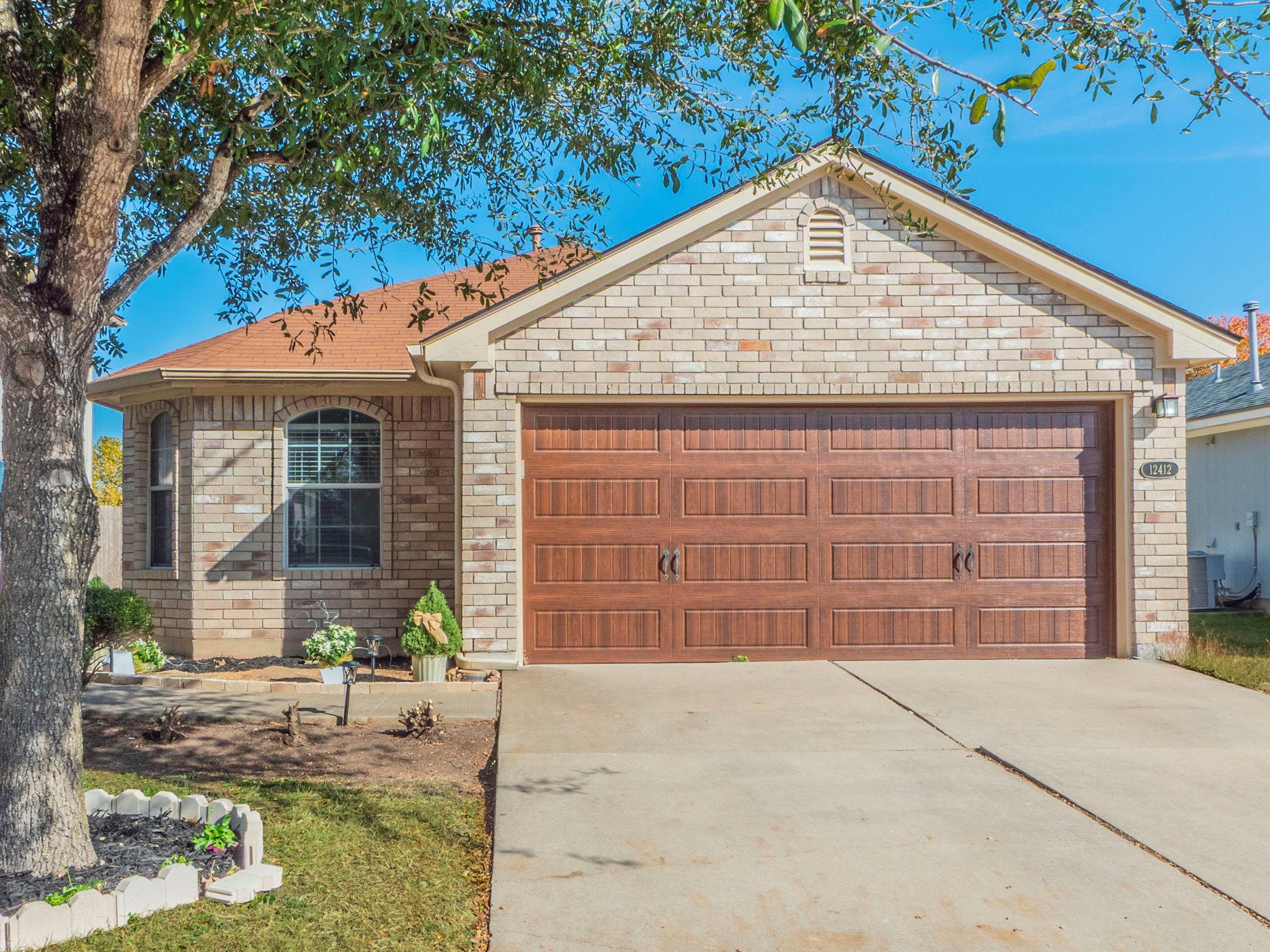 Classic brick elevation highlights this single-st