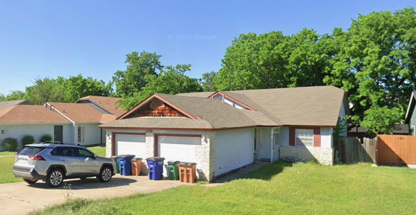 Established ranch home features a prominent front