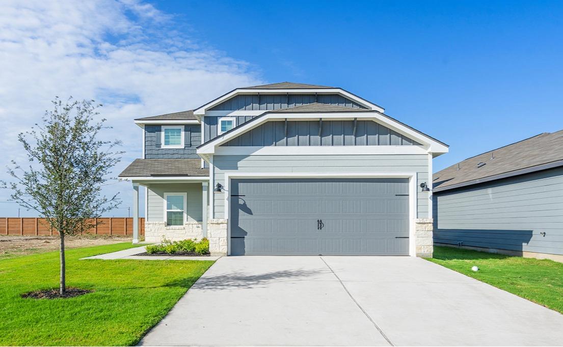 Contemporary two-story residence with a two-car g