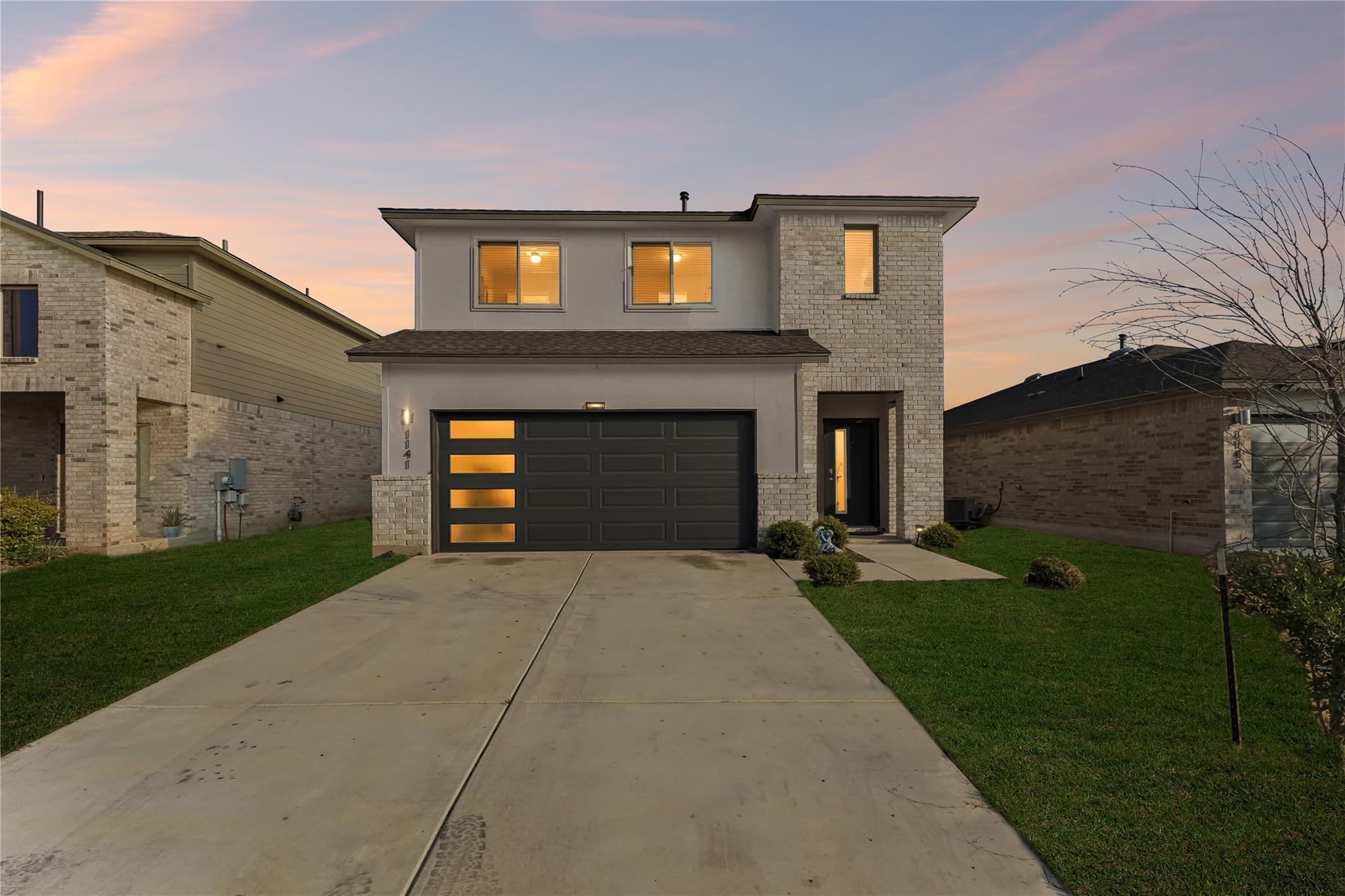 Clean architectural lines and a brick exterior de