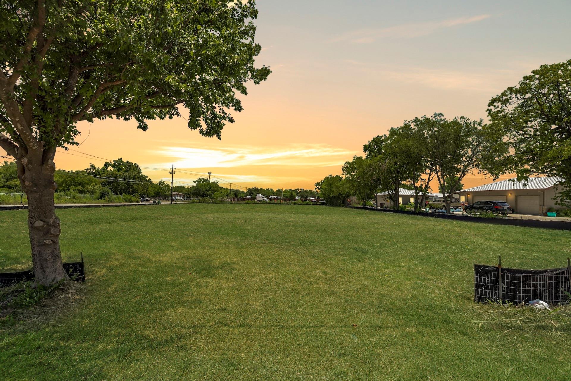 View of yard at dusk