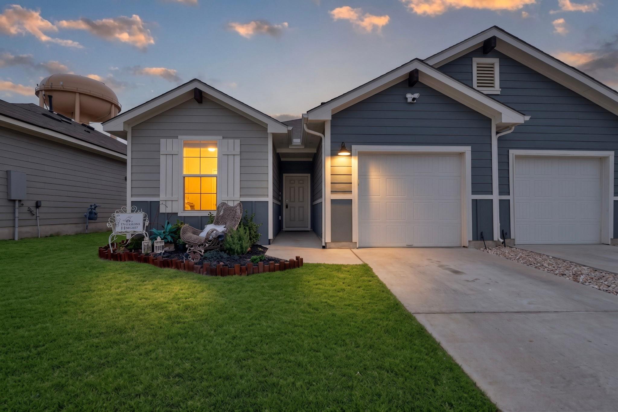 Craftsman siding and neat gables create appealing