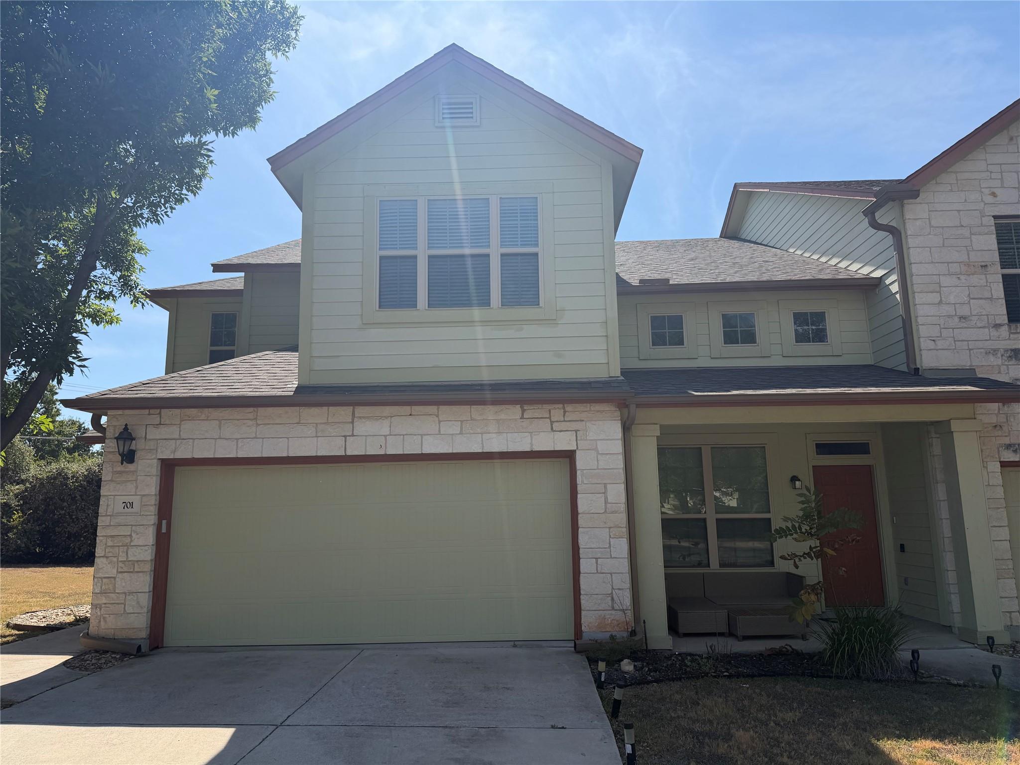 A classic stone and siding exterior coordinates p