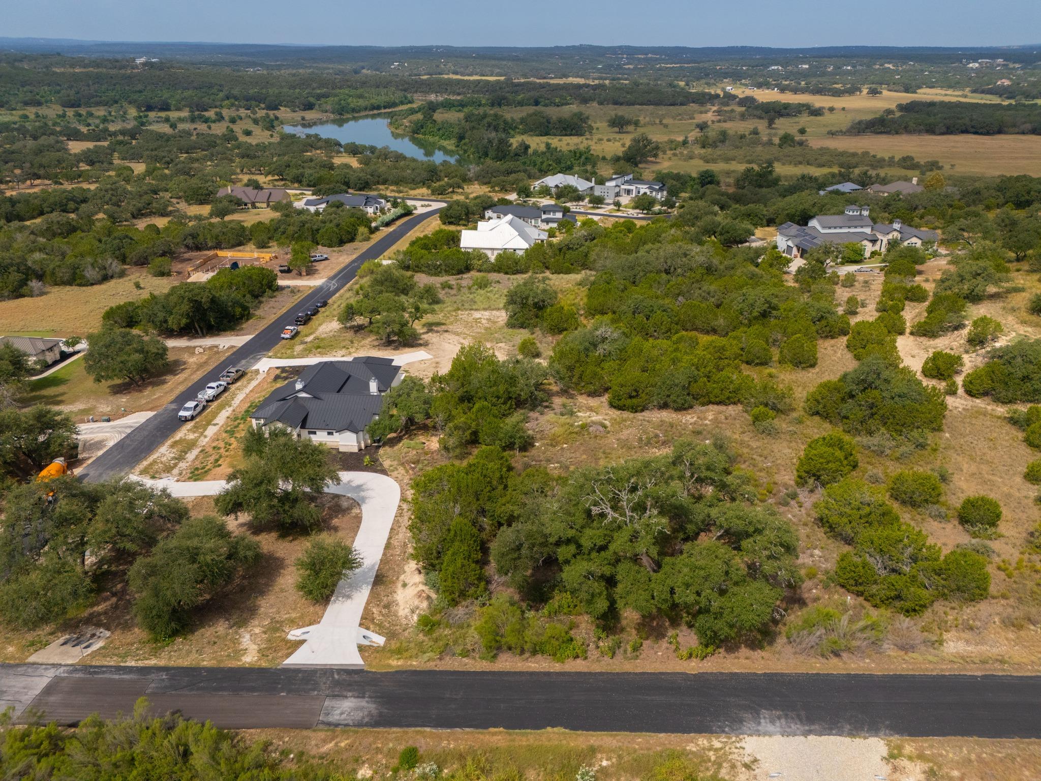 A spacious hillside homesite offers panoramic vie