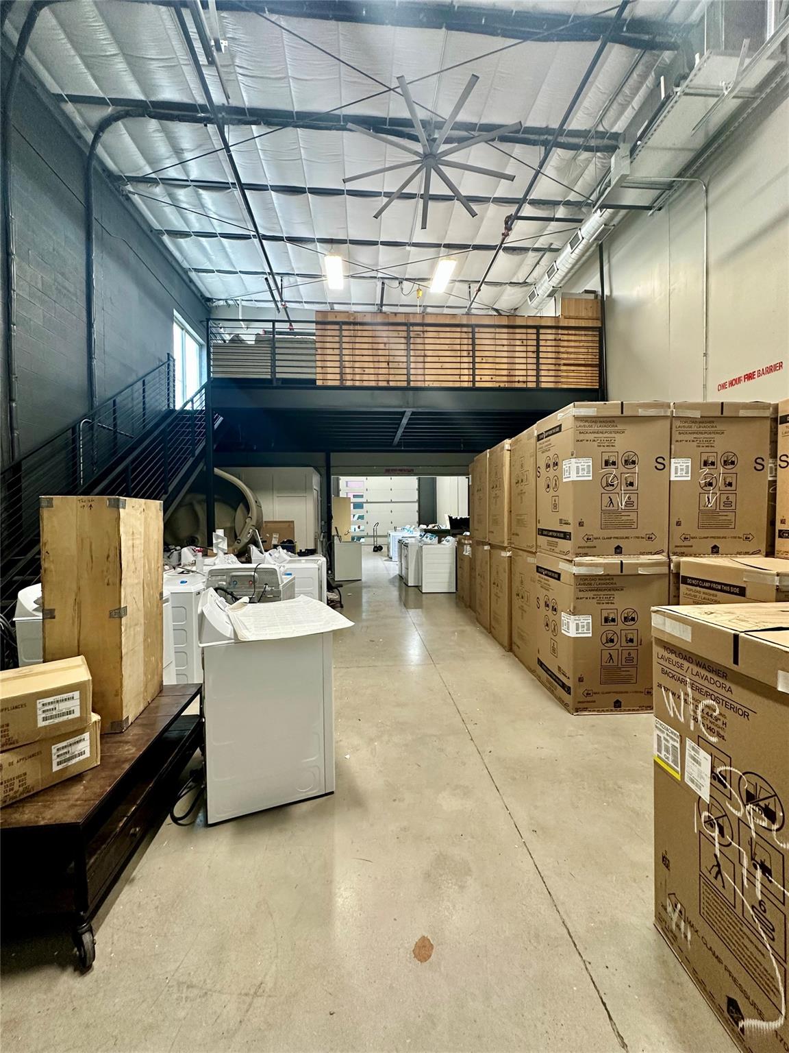 Industrial warehouse space features high ceilings