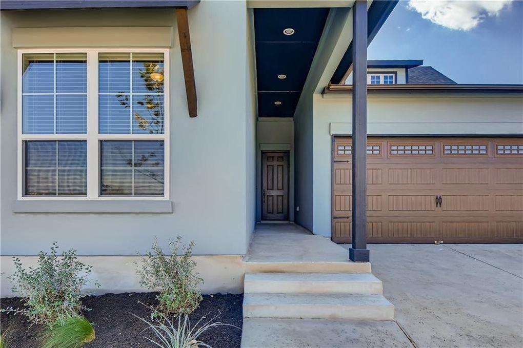 Concrete steps lead past low-maintenance planting