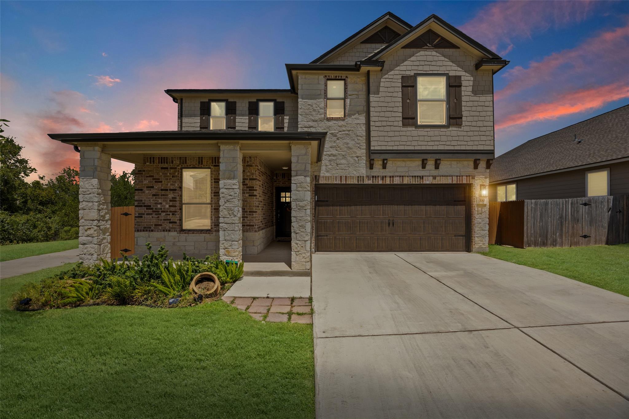A spacious driveway leads to this multi-level hom